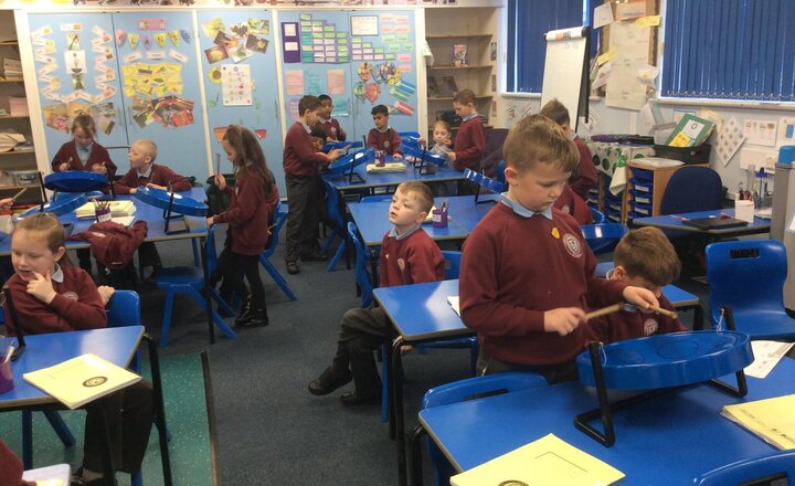 Image of Then drumming in our Music lesson.