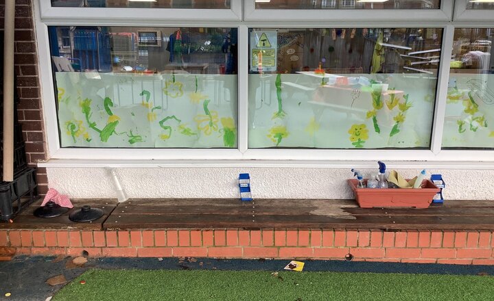Image of Yesterday we talked about Spring and the changes in our environment. The children then enjoyed painting in the sunshine making a lovely window display.